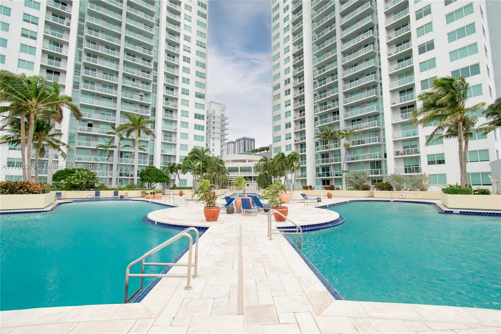 Miami Central Business District Miami, FL 33132 - Photo 17 of 23 a view of swimming pool with outdoor seating and plants