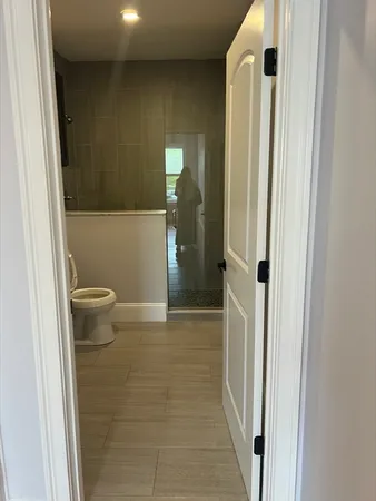 a bathroom with a sink and a toilet