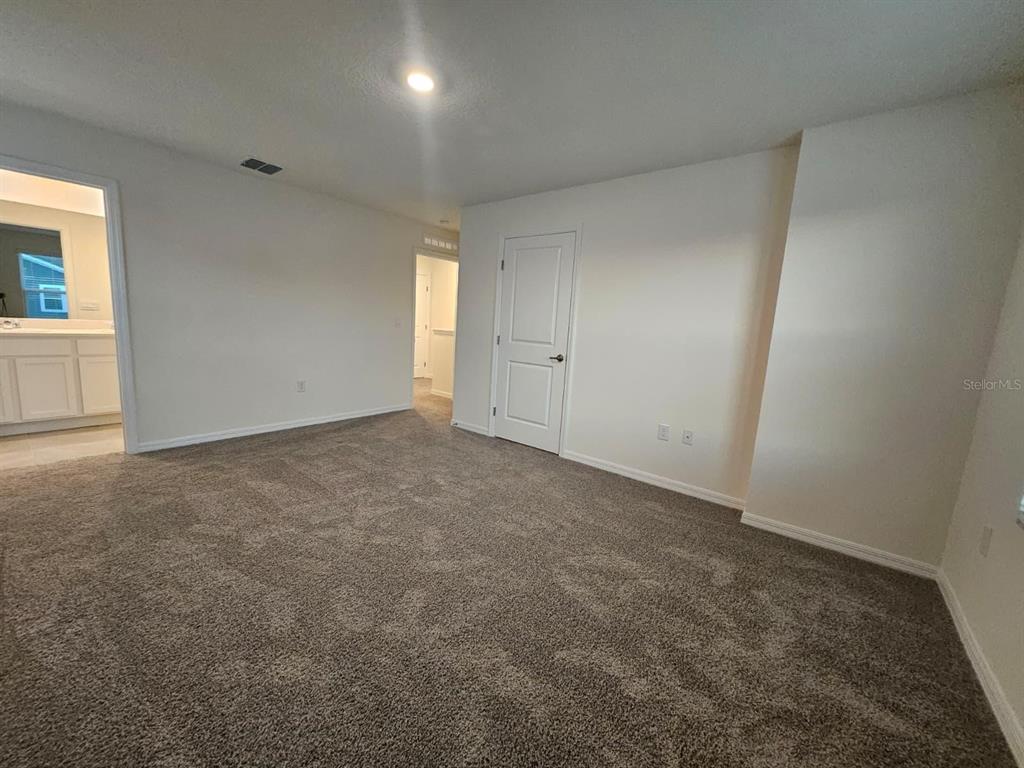 6577 Southwest 81st Loop Ocala, FL 34476 - Photo 14 of 25 a view of an empty room and a window