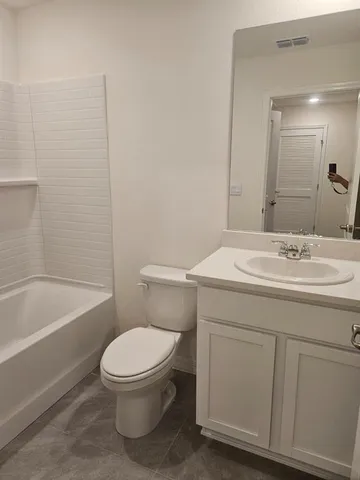 a view of a hallway with closet