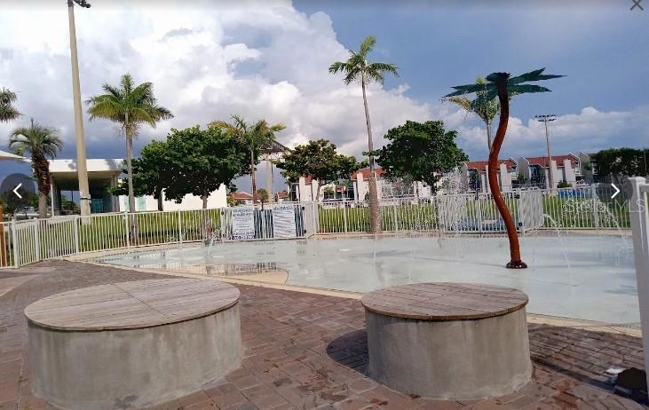 230 Medallion Boulevard, Unit G Madeira Beach, FL 33708 - Photo 40 of 44 a view of a backyard of a house