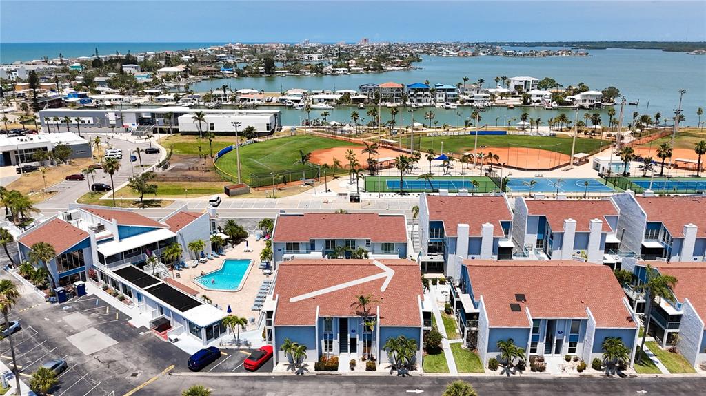 230 Medallion Boulevard, Unit G Madeira Beach, FL 33708 - Photo 42 of 44 an aerial view of multiple house