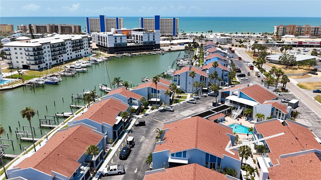 230 Medallion Boulevard, Unit G Madeira Beach, FL 33708 - Photo 44 of 44 a view of a city with lake