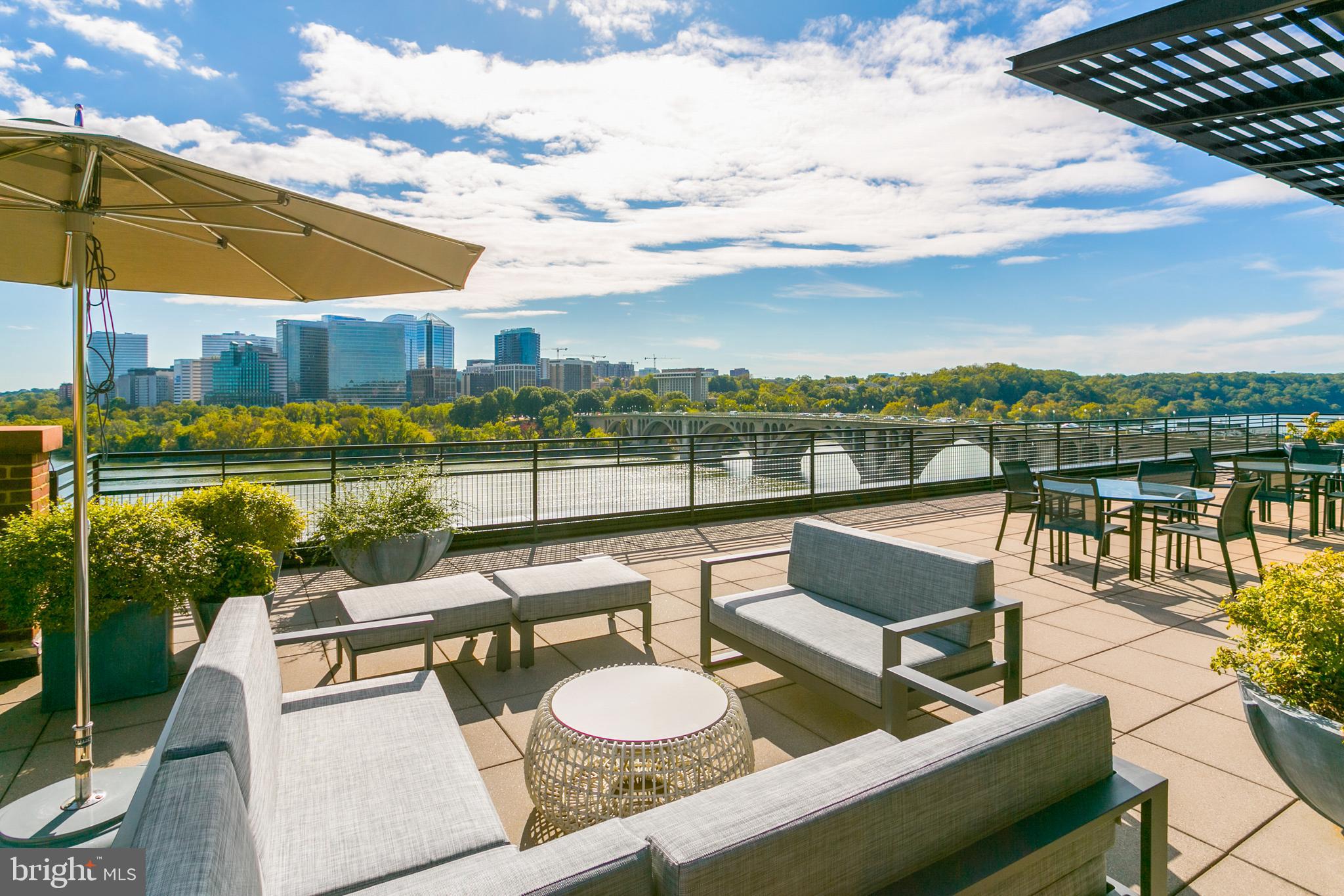 3303 Water Street Northwest, Unit 3B Washington, DC 20007 - Photo 19 of 25 a view of a ocean from a balcony