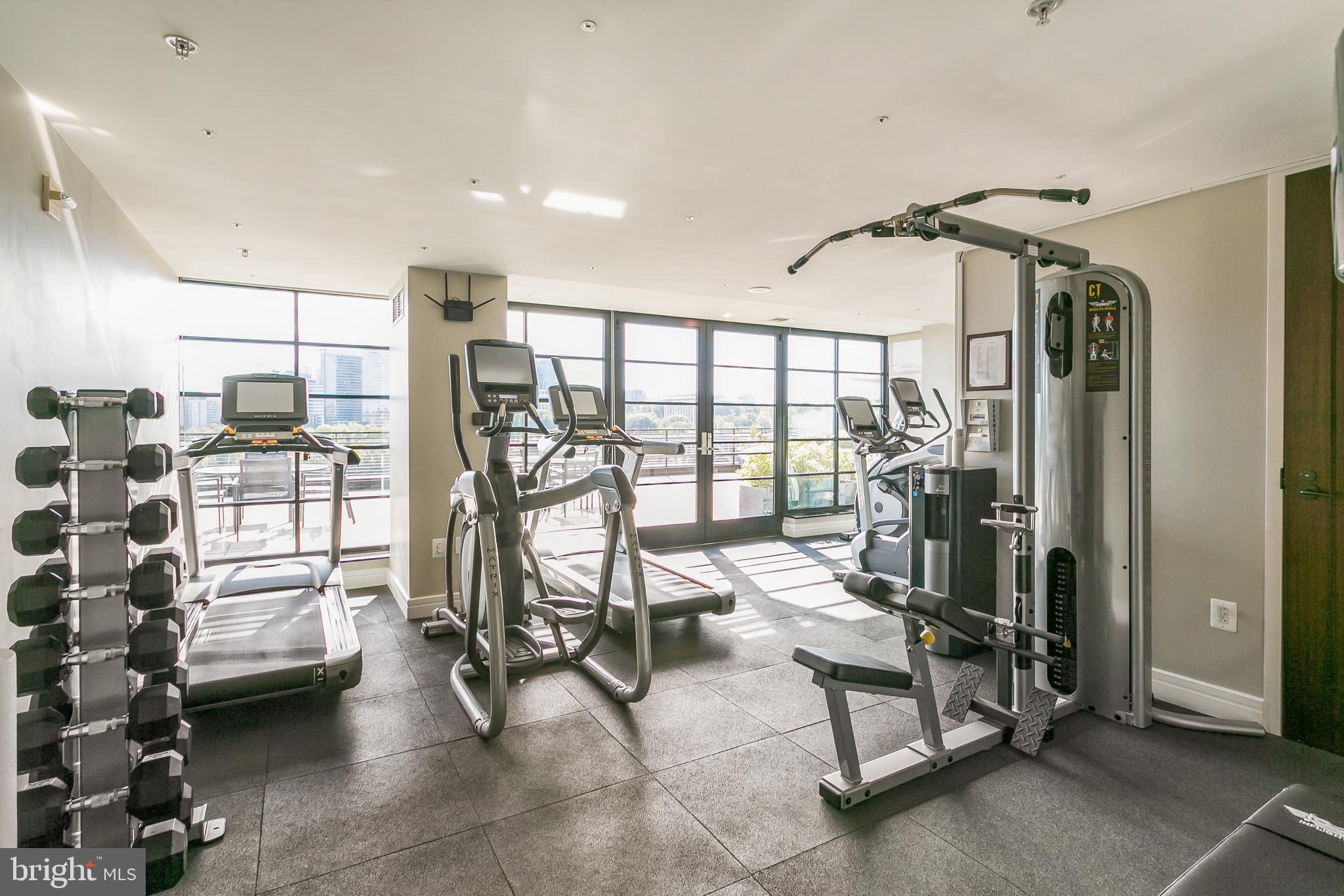 3303 Water Street Northwest, Unit 3B Washington, DC 20007 - Photo 21 of 25 a view of a room with gym equipment