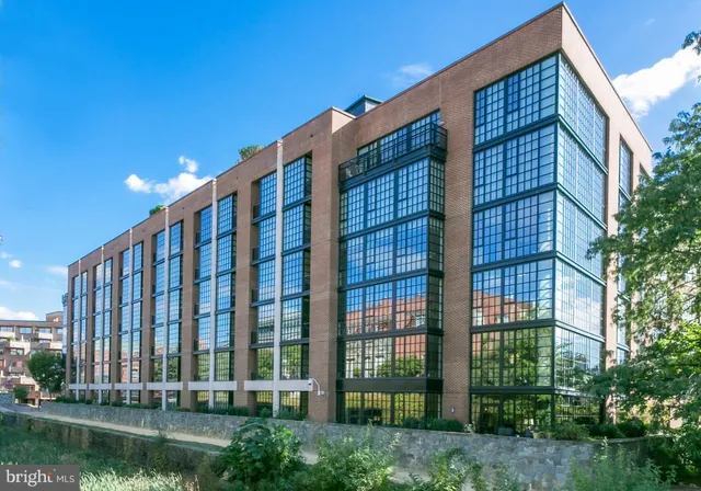 a view of livingroom with floor to ceiling window