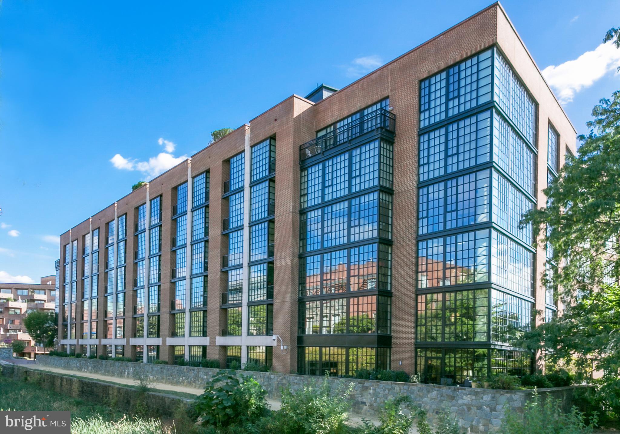 3303 Water Street Northwest, Unit 3B Washington, DC 20007 - Photo 22 of 25 a front view of a building with balcony