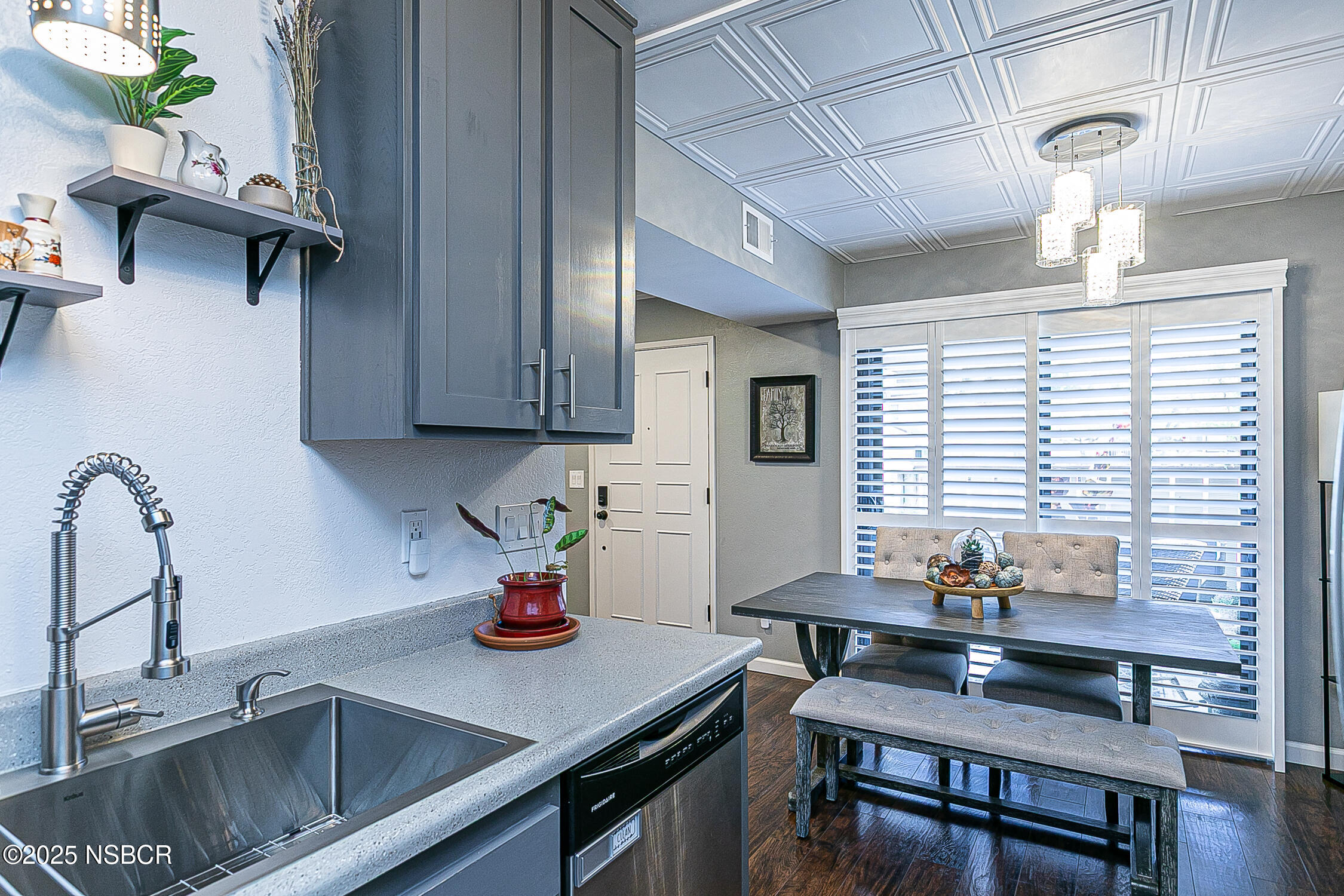 1193 Sumner Place, Unit C Santa Maria, CA 93455 - Photo 12 of 22 a kitchen with a sink cabinets and window