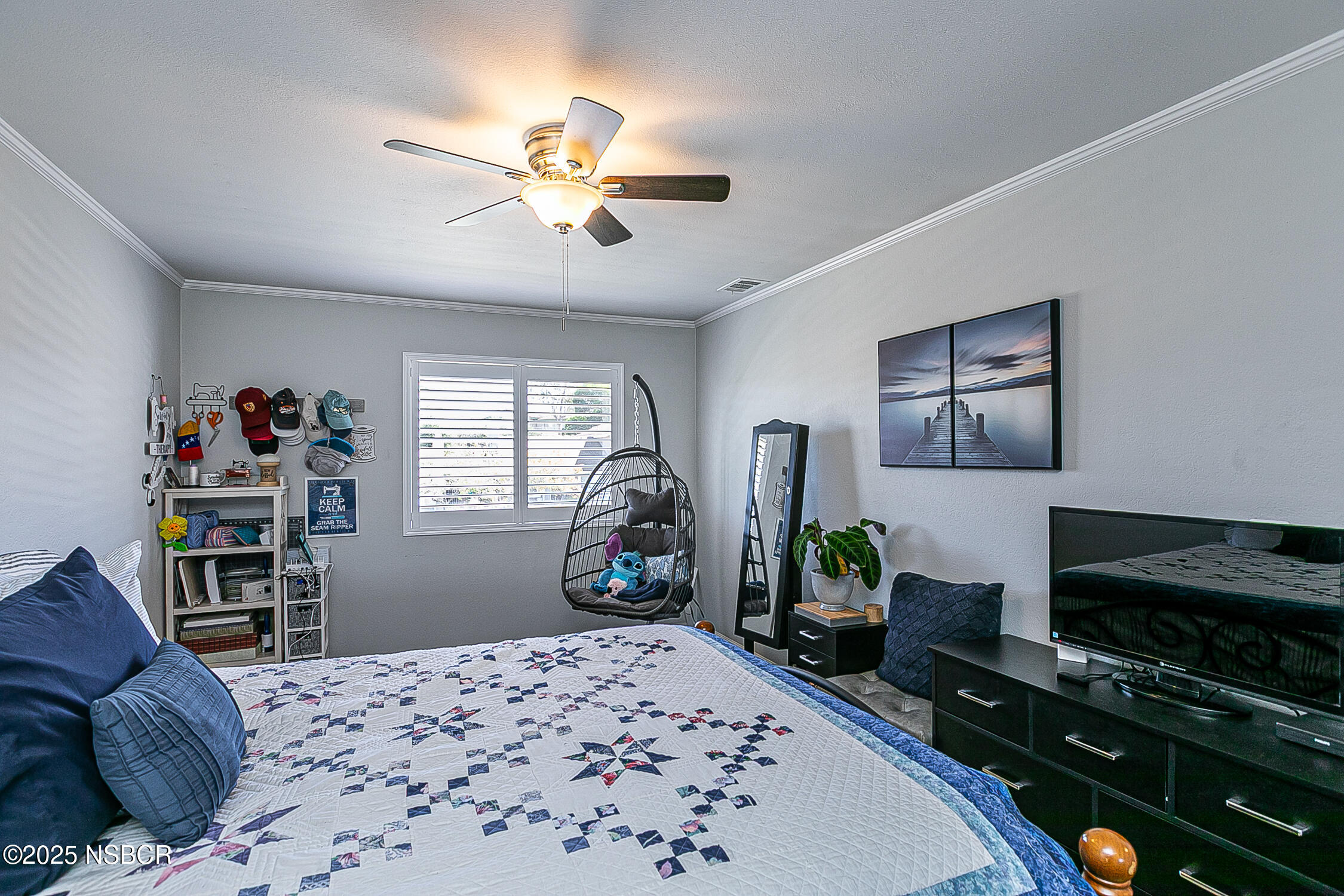 1193 Sumner Place, Unit C Santa Maria, CA 93455 - Photo 14 of 22 a bedroom with a bed and a flat screen tv