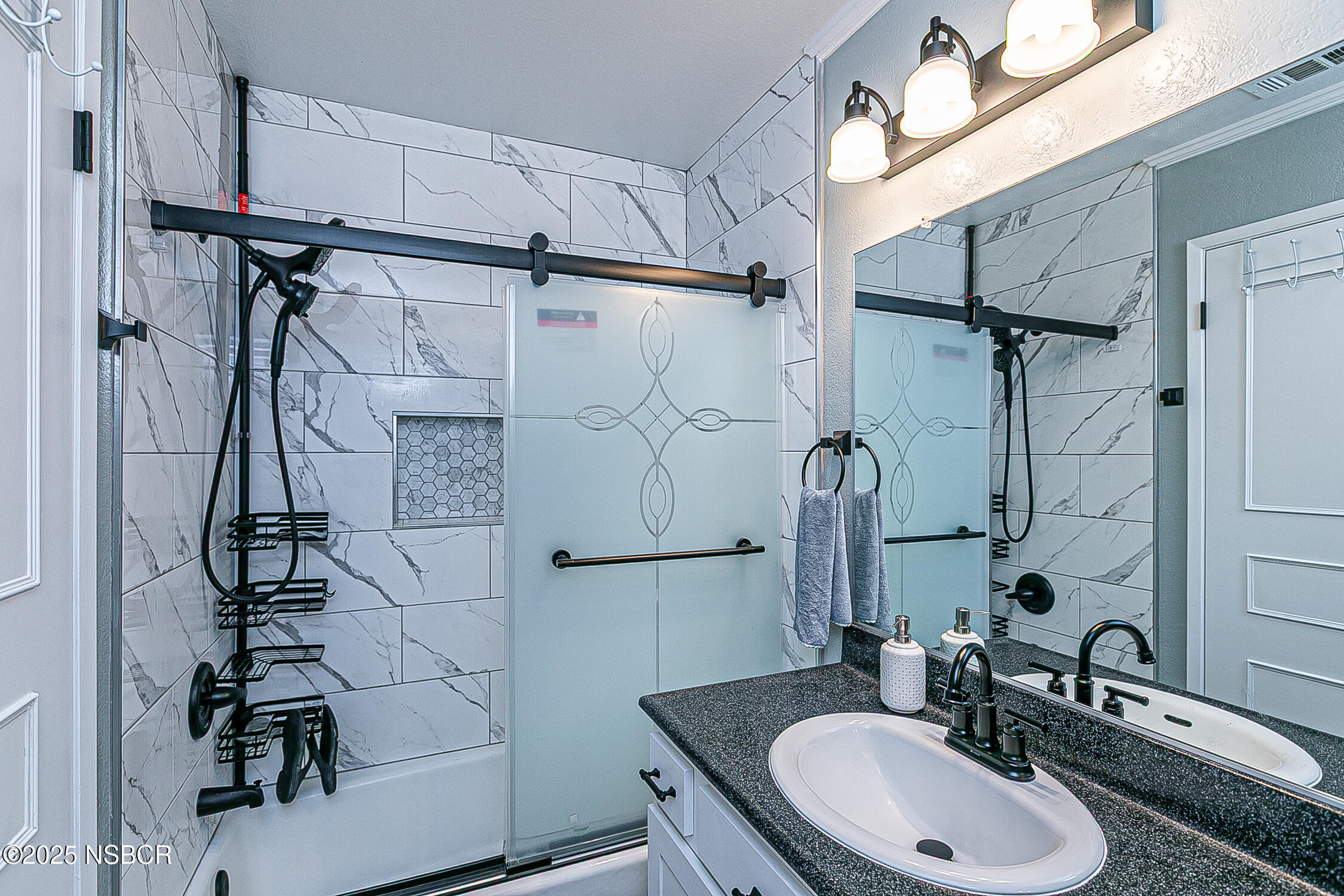 1193 Sumner Place, Unit C Santa Maria, CA 93455 - Photo 17 of 22 a bathroom with a sink toilet and shower