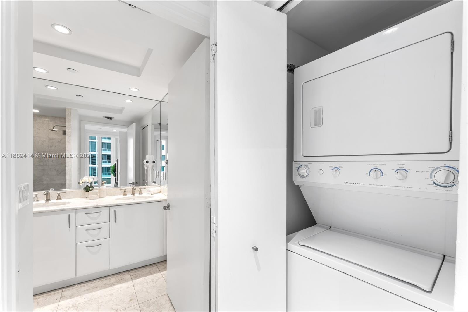 1331 Brickell Bay Drive, Unit 1706 Miami, FL 33131 - Photo 13 of 17 a view of bathroom with a sink and mirror