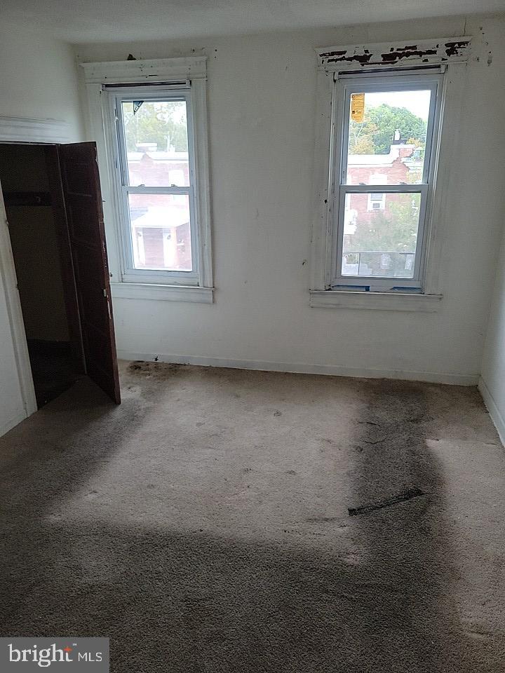 3011 Kenyon Avenue Baltimore, MD 21213 - Photo 10 of 14 an empty room with a window