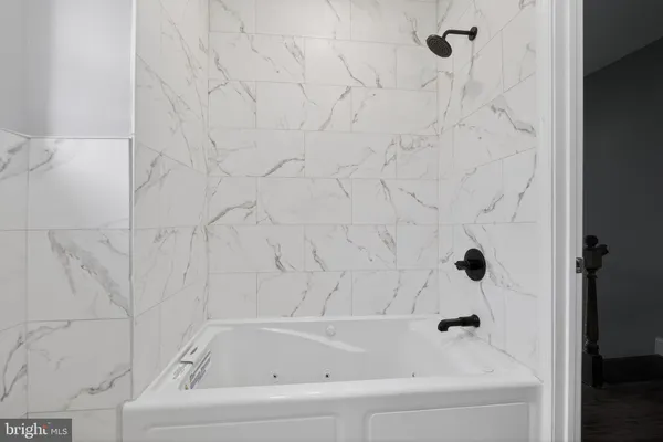 a bathroom with a bathtub