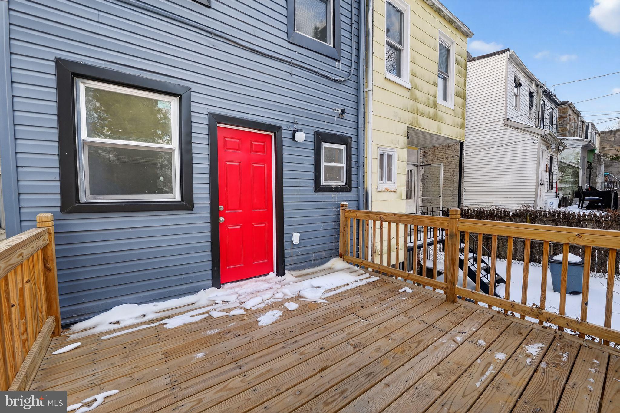5018 Belair Road Baltimore, MD 21206 - Photo 30 of 32 a view of a house with wooden deck