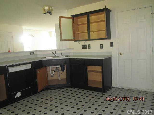 10 Riverside Street Lowell, NC 28098 - Photo 10 of 10 a bathroom with a sink a vanity and a mirror
