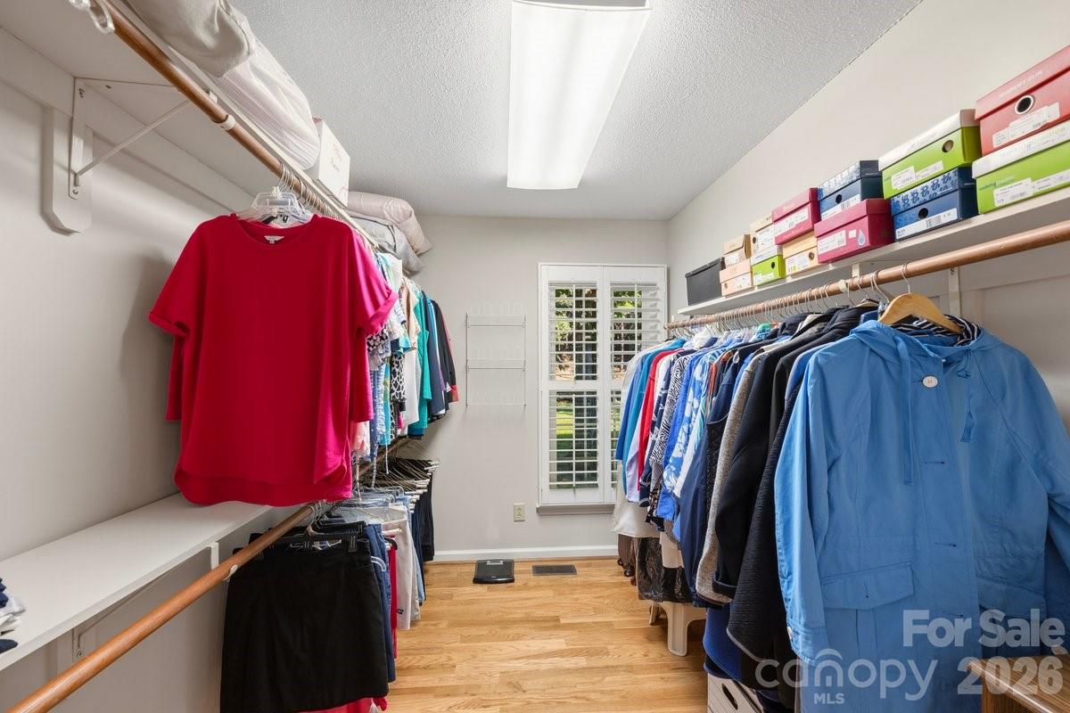 207 Lost Corner Road Morganton, NC 28655 - Photo 33 of 46 a view of walk in closet with clothes and shoes