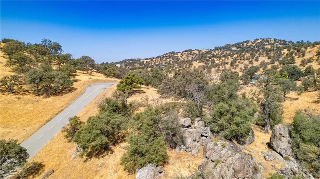 a view of a large building with a mountain in the background