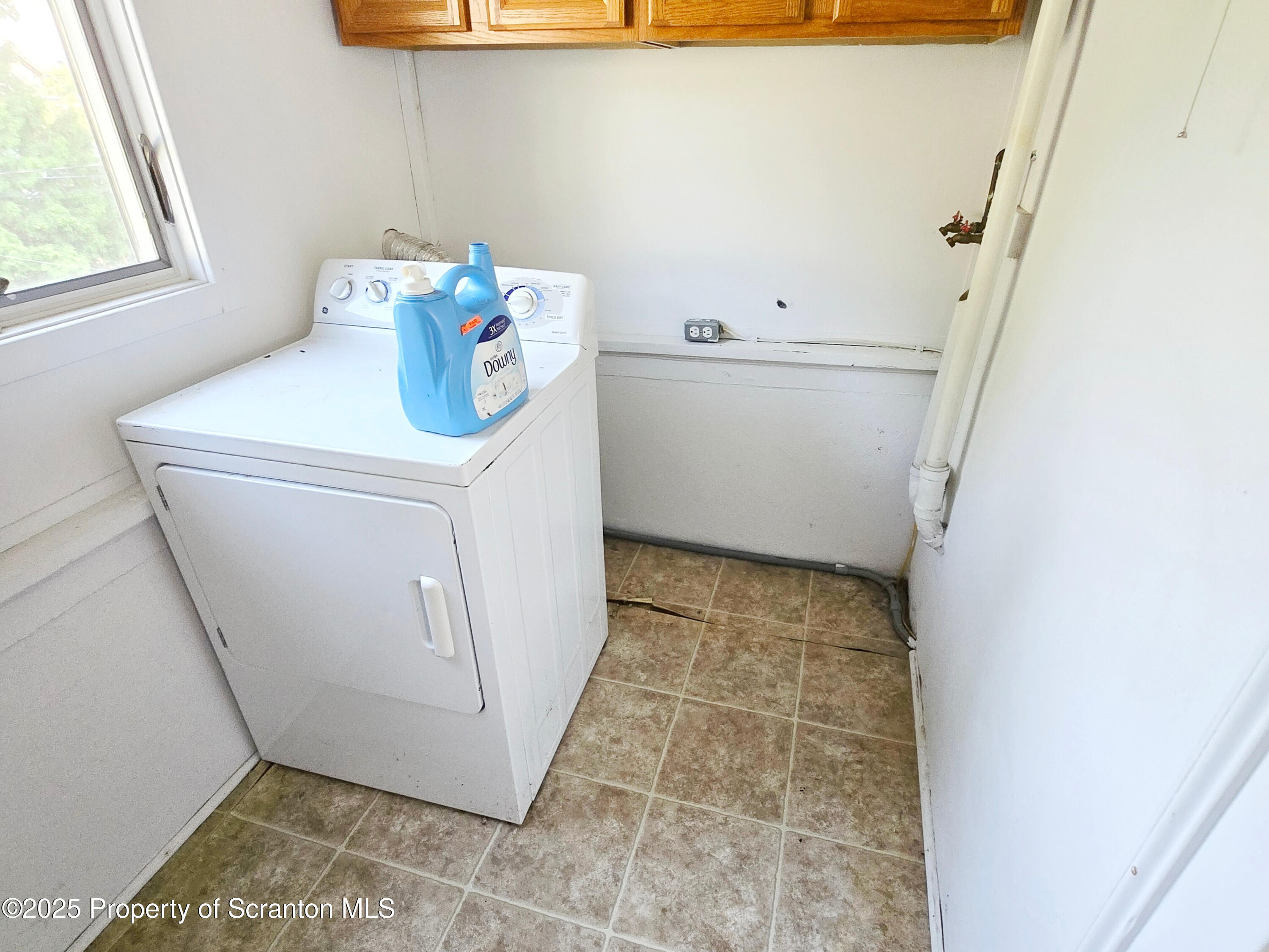 542 Colfax Avenue, Unit 2 Scranton, PA 18510 - Photo 13 of 15 a bathroom with a sink and a vanity
