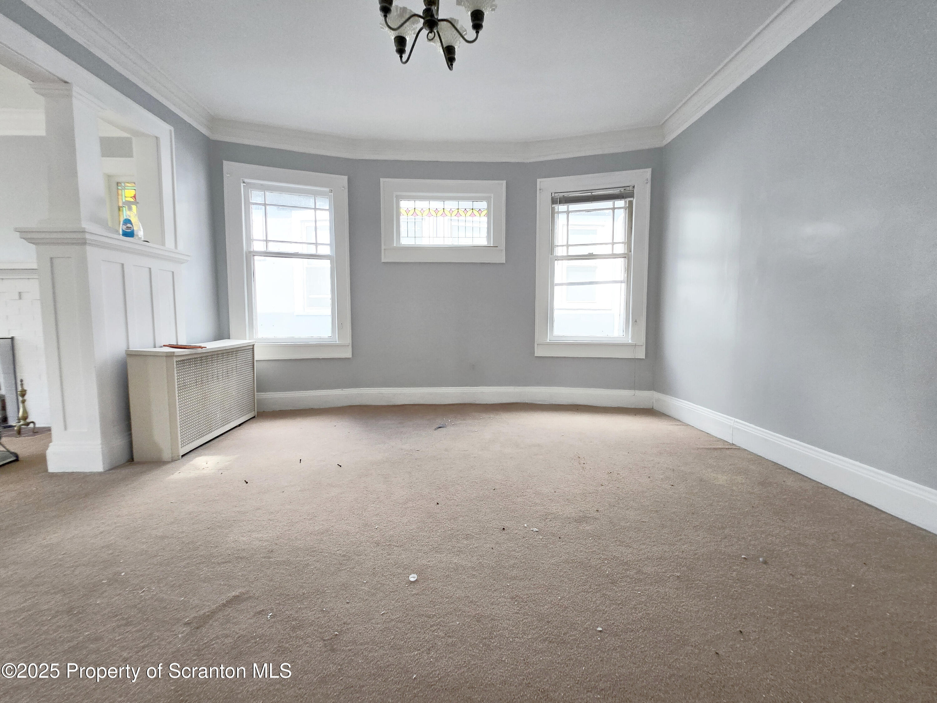 542 Colfax Avenue, Unit 2 Scranton, PA 18510 - Photo 14 of 15 an empty room with windows