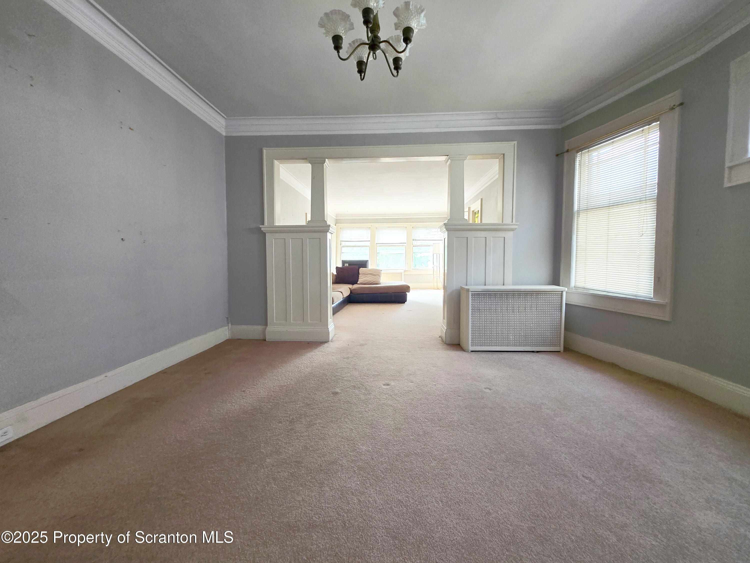 542 Colfax Avenue, Unit 2 Scranton, PA 18510 - Photo 3 of 15 an empty room with a window