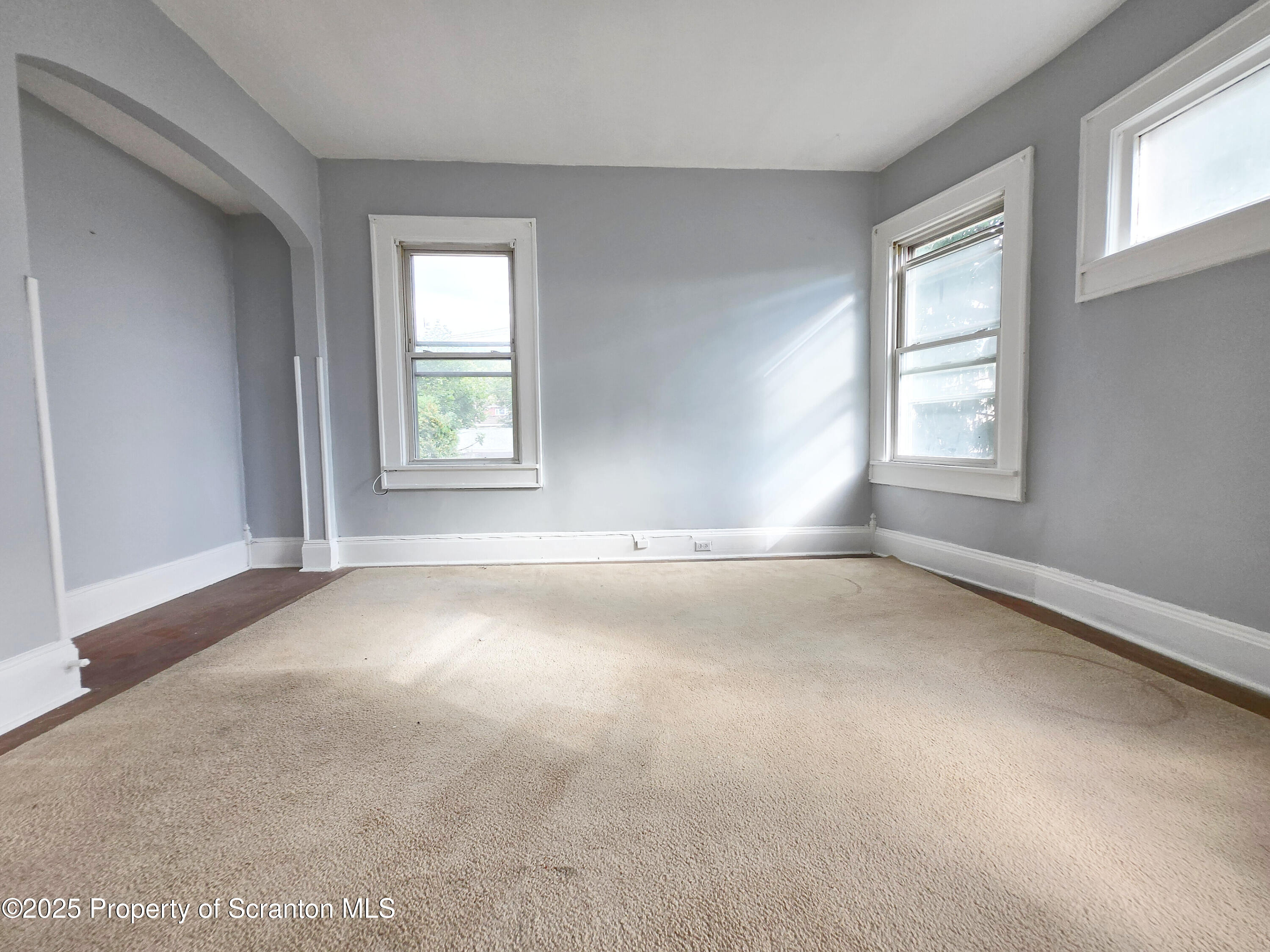 542 Colfax Avenue, Unit 2 Scranton, PA 18510 - Photo 9 of 15 an empty room with a window
