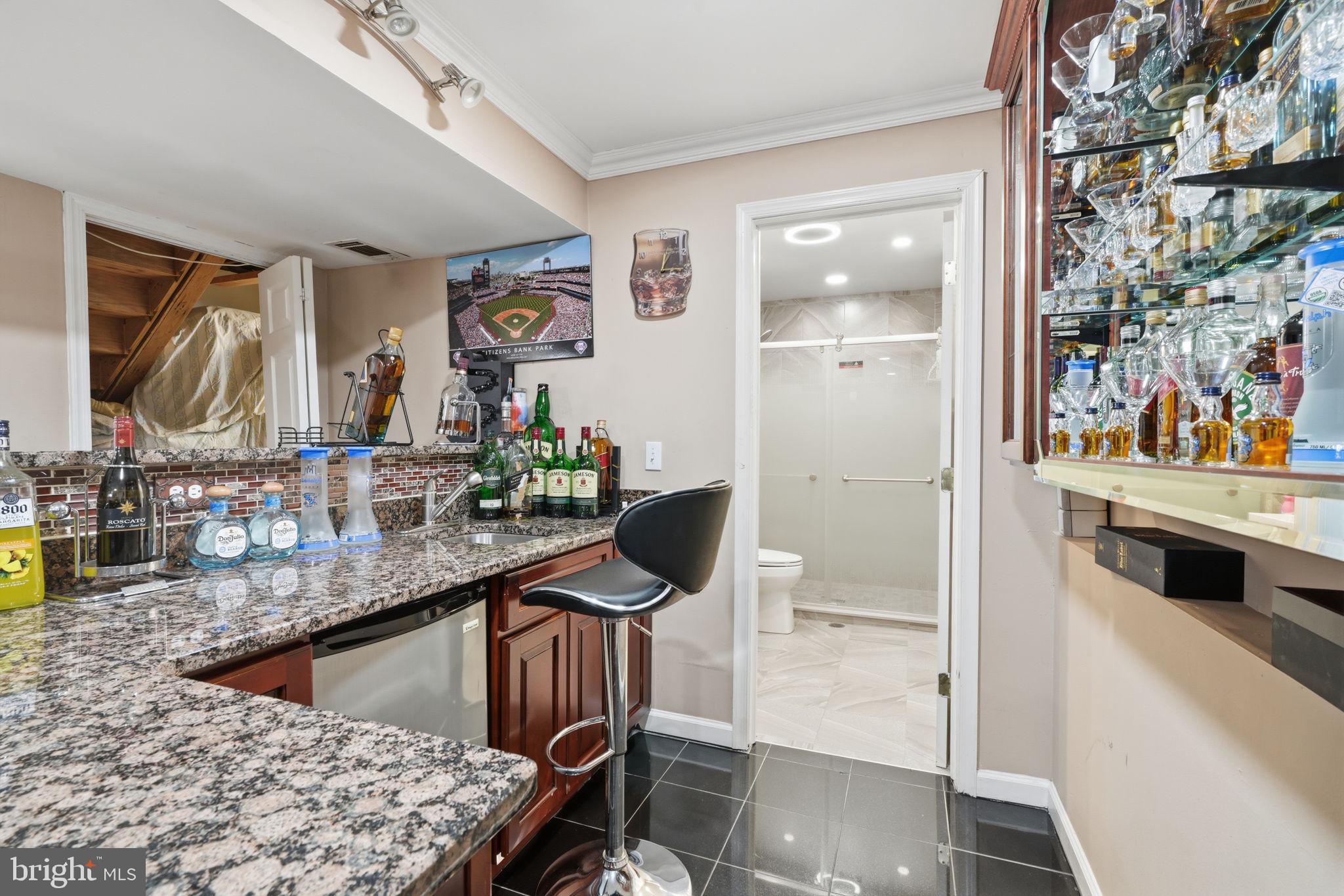2347 Maple Avenue Croydon, PA 19021 - Photo 34 of 60 Stylish basement bar with modern flair.