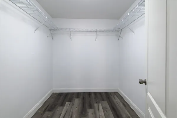 a view of a room with racks on the wall