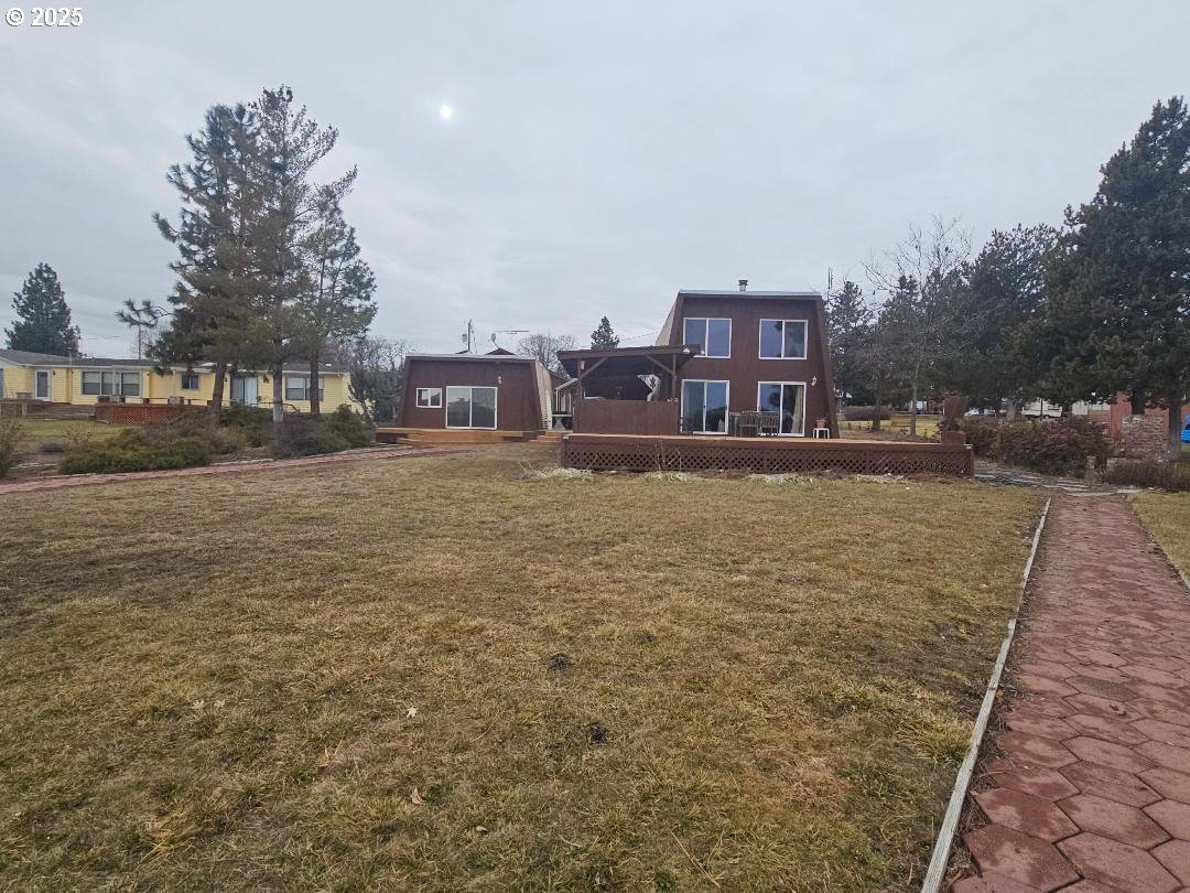 73 South Lakewood Road Tygh Valley, OR 97063 - Photo 11 of 44 a view of a yard next to a building