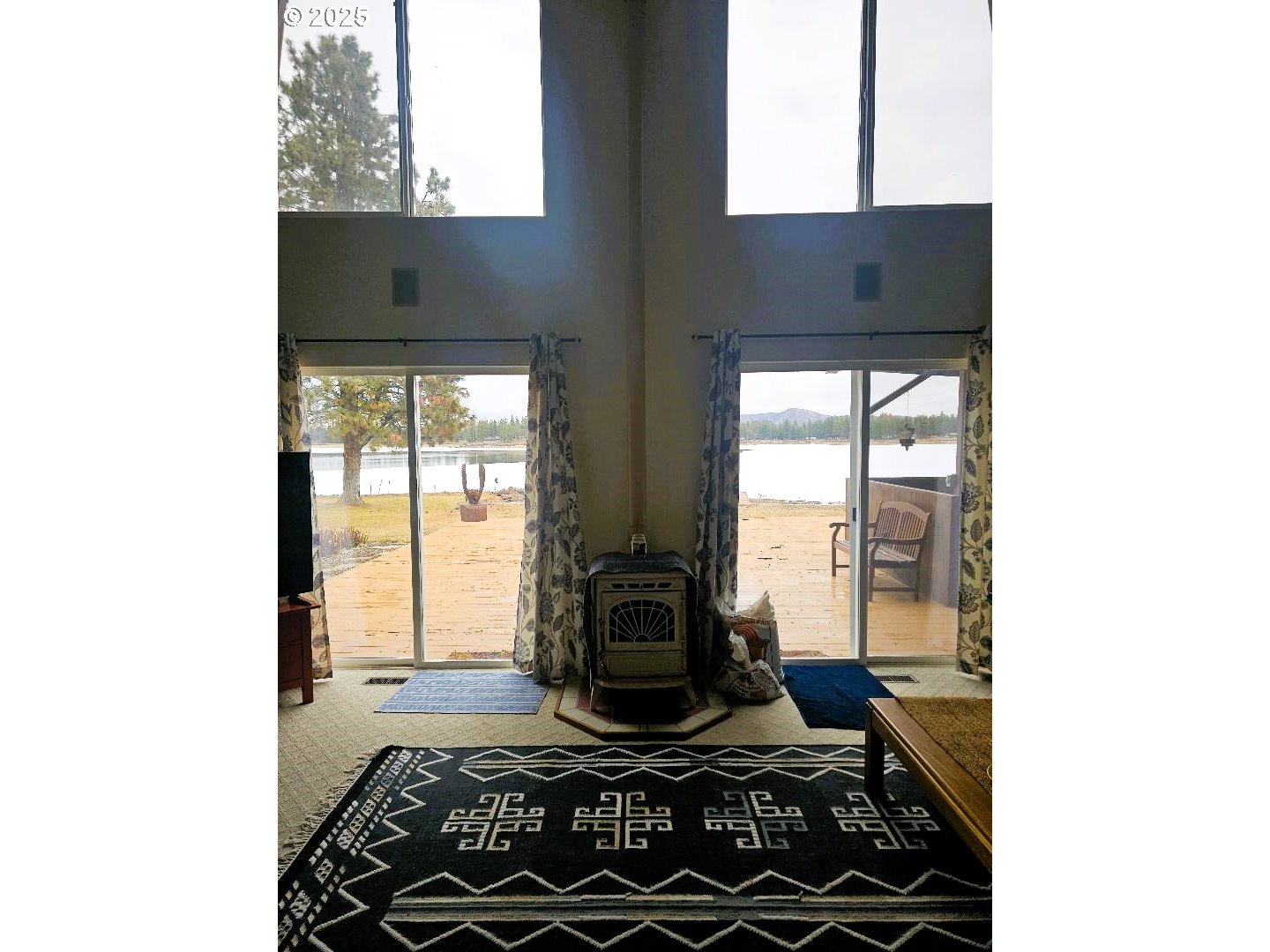 73 South Lakewood Road Tygh Valley, OR 97063 - Photo 14 of 44 a living room with furniture and large windows
