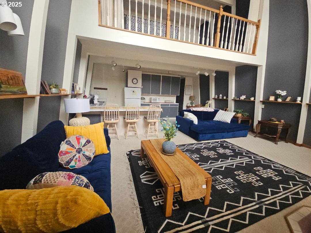 73 South Lakewood Road Tygh Valley, OR 97063 - Photo 15 of 44 a living room with furniture and a rug