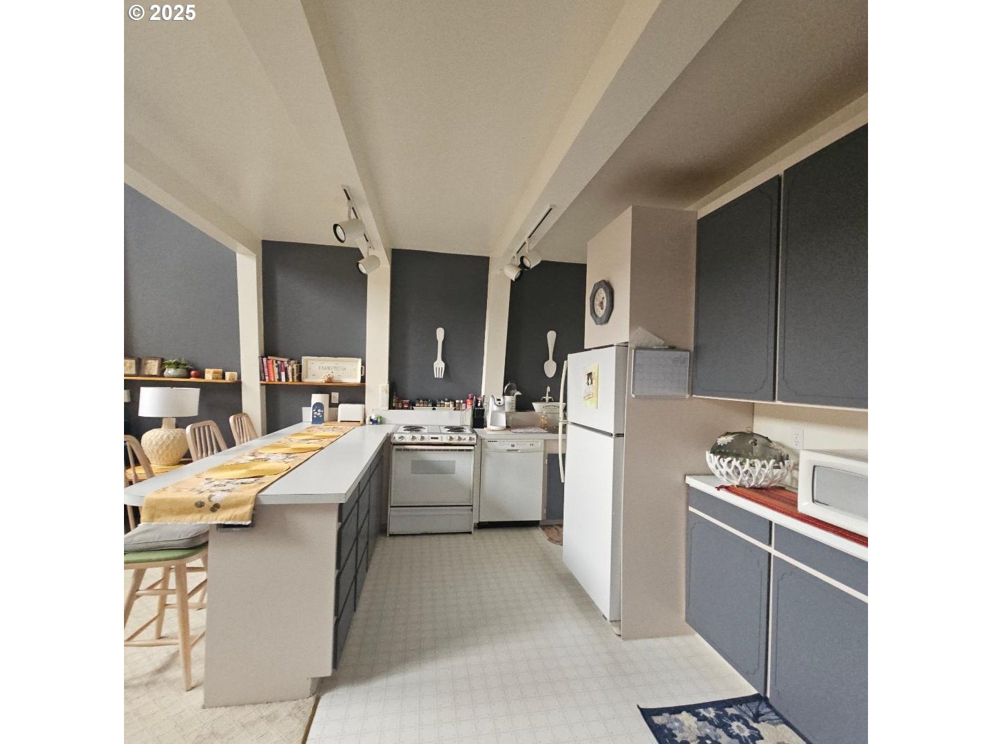 73 South Lakewood Road Tygh Valley, OR 97063 - Photo 22 of 44 a kitchen with refrigerator and cabinets