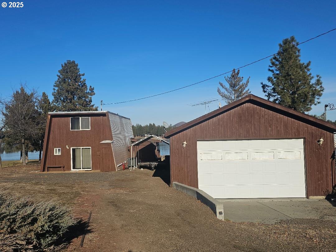 73 South Lakewood Road Tygh Valley, OR 97063 - Photo 37 of 44 a front view of a house with a yard