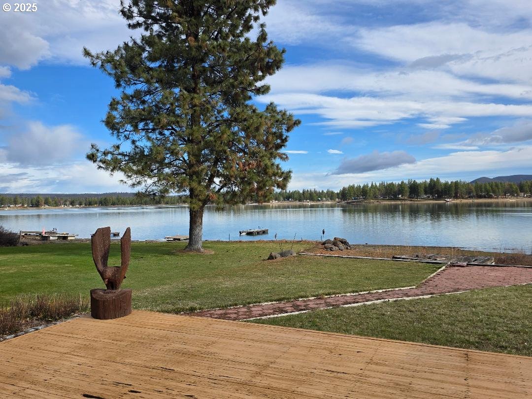 73 South Lakewood Road Tygh Valley, OR 97063 - Photo 42 of 44 a view of a lake with houses in the back
