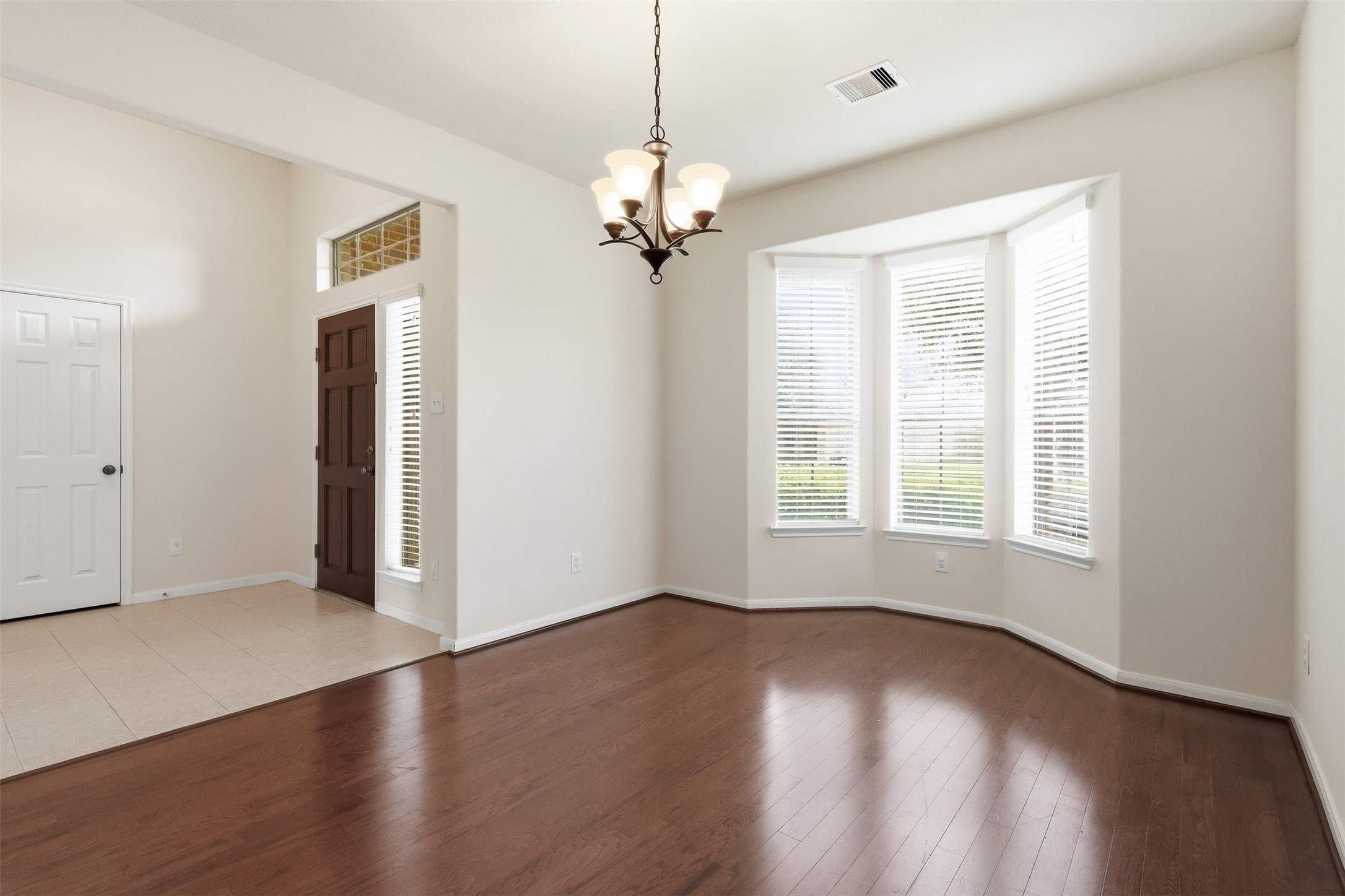 1911 Vale Brook Drive Spring, TX 77373 - Photo 3 of 27 The formal dining room features elegant bay windows that fill the space with abundant natural light.
