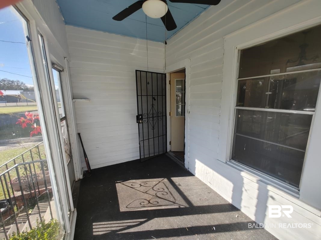1706 Lomeroy Street Mobile, AL 36604 - Photo 4 of 24 View of unfurnished sunroom