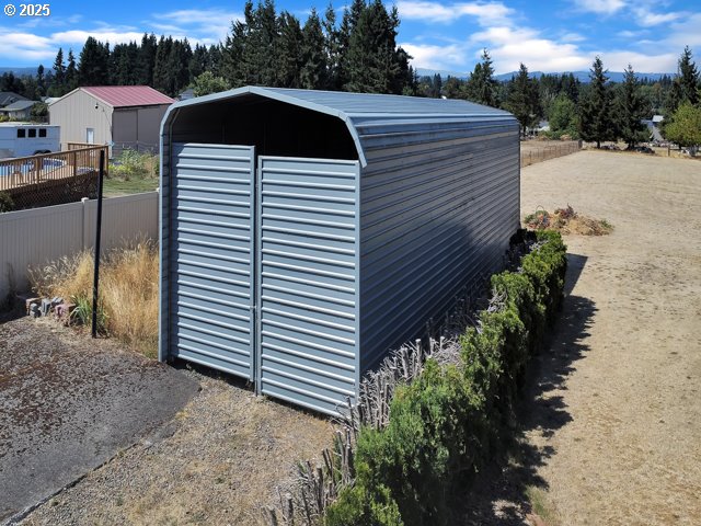 6593 Rippling Brook Drive Southeast Salem, OR 97317 - Photo 27 of 48 a front view of a house with a yard