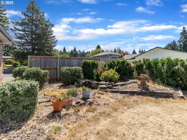6593 Rippling Brook Drive Southeast Salem, OR 97317 - Photo 30 of 48 a view of a backyard