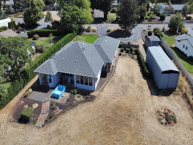 6593 Rippling Brook Drive Southeast Salem, OR 97317 - Photo 34 of 48 an aerial view of a house with swimming pool and trees