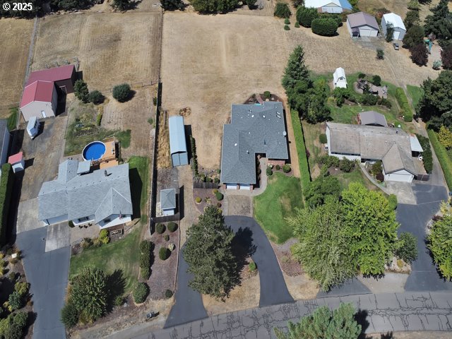 6593 Rippling Brook Drive Southeast Salem, OR 97317 - Photo 35 of 48 an aerial view of residential houses with outdoor space