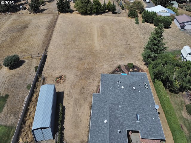 6593 Rippling Brook Drive Southeast Salem, OR 97317 - Photo 40 of 48 an aerial view of a house with a yard and garage