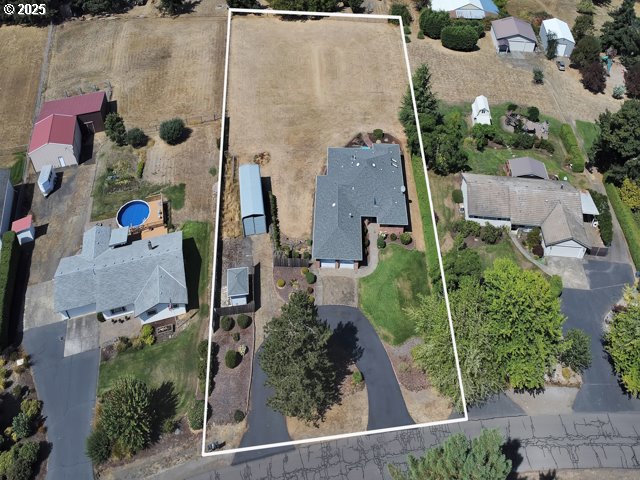 6593 Rippling Brook Drive Southeast Salem, OR 97317 - Photo 44 of 48 an aerial view of residential houses with outdoor space