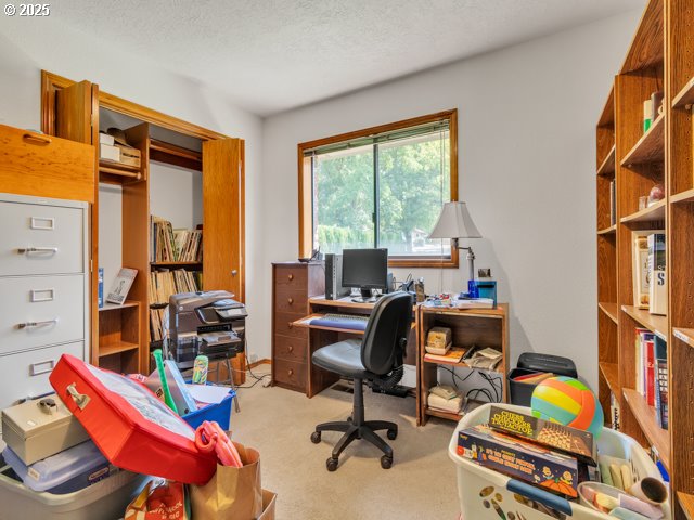 6593 Rippling Brook Drive Southeast Salem, OR 97317 - Photo 6 of 48 a view of a workspace with furniture and a window