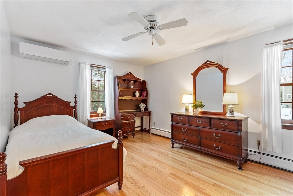 53 Throne Hill Road Groton, MA 01450 - Photo 22 of 38 a living room with furniture and a dresser