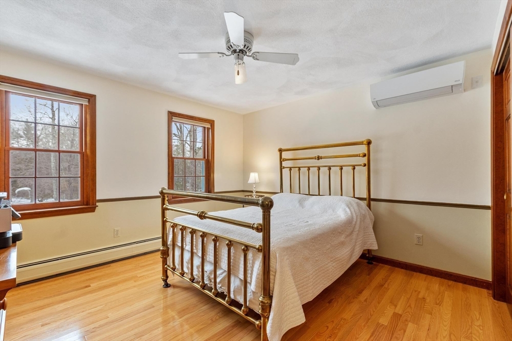 53 Throne Hill Road Groton, MA 01450 - Photo 23 of 38 a bedroom with a bed and window