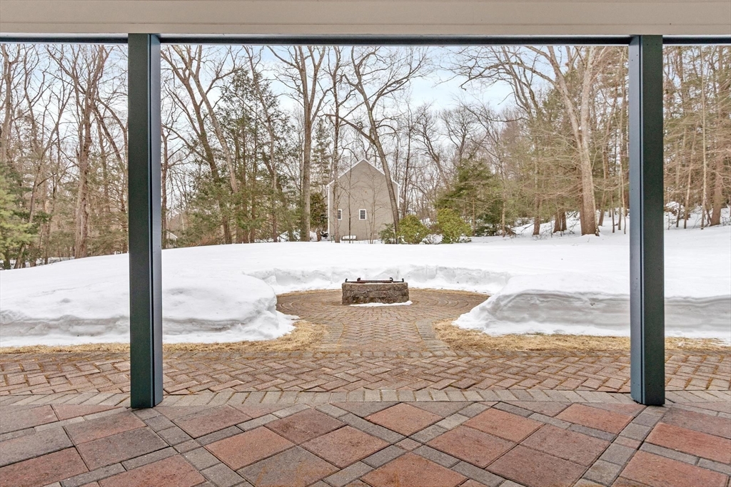 53 Throne Hill Road Groton, MA 01450 - Photo 31 of 38 a view of a porch and a yard