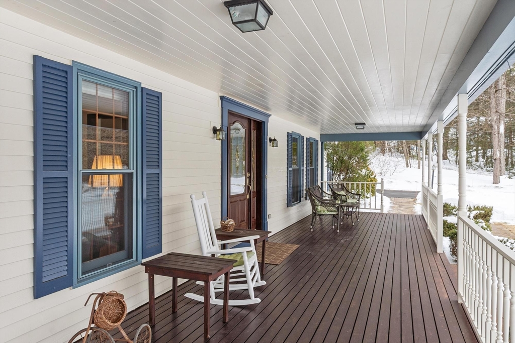 53 Throne Hill Road Groton, MA 01450 - Photo 5 of 38 a view of a room with furniture and wooden floor