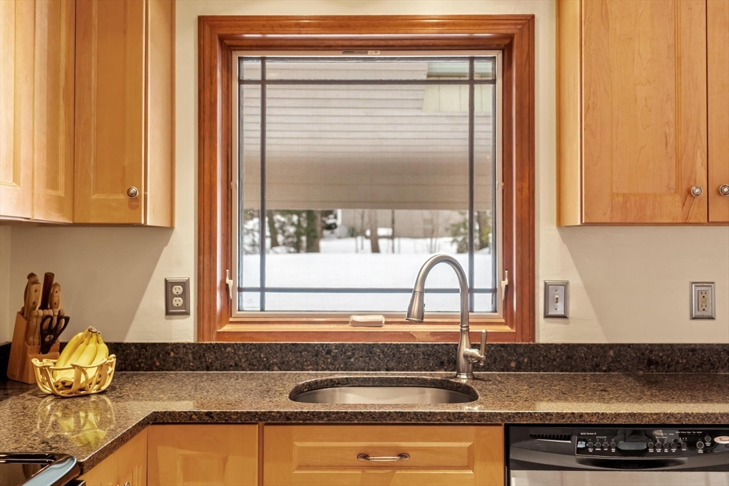 53 Throne Hill Road Groton, MA 01450 - Photo 9 of 38 a kitchen with a sink and a window