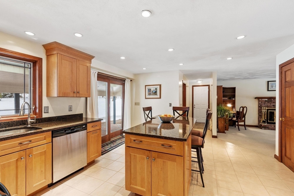 53 Throne Hill Road Groton, MA 01450 - Photo 10 of 38 a kitchen with granite countertop a sink and counter space