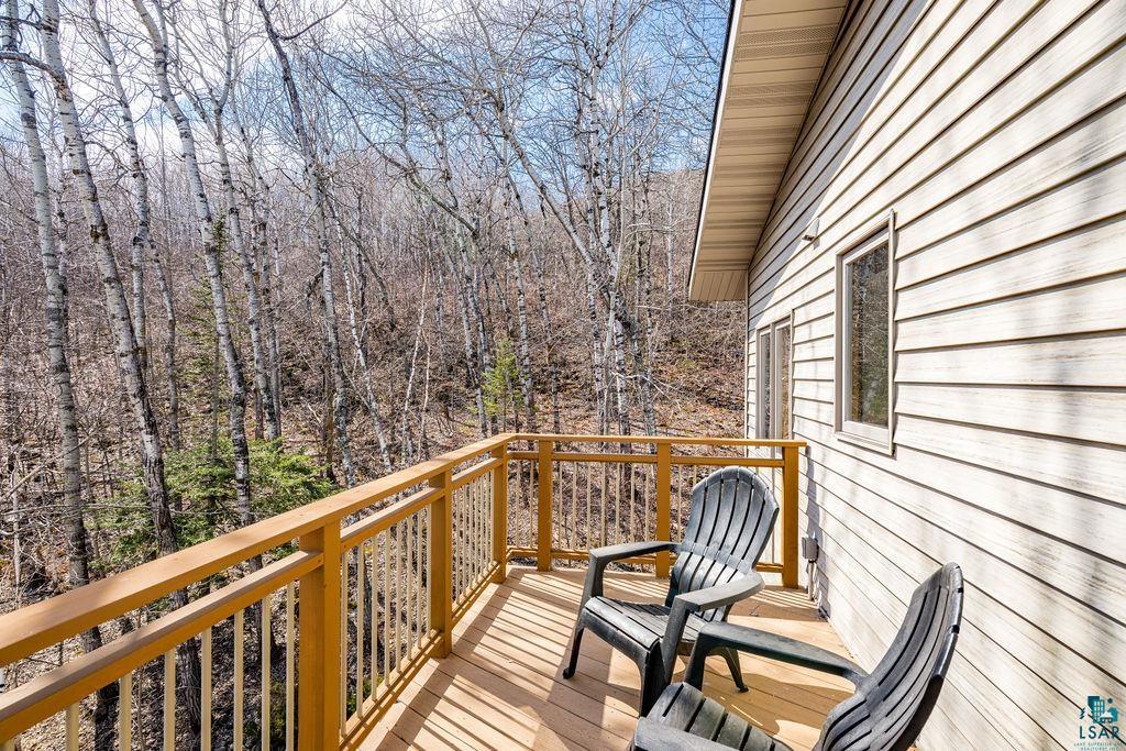 4856 Kingston Street Duluth, MN 55804 - Photo 55 of 88 Outdoor deck featuring wood-finish flooring, natural wood railings, and a siding exterior
