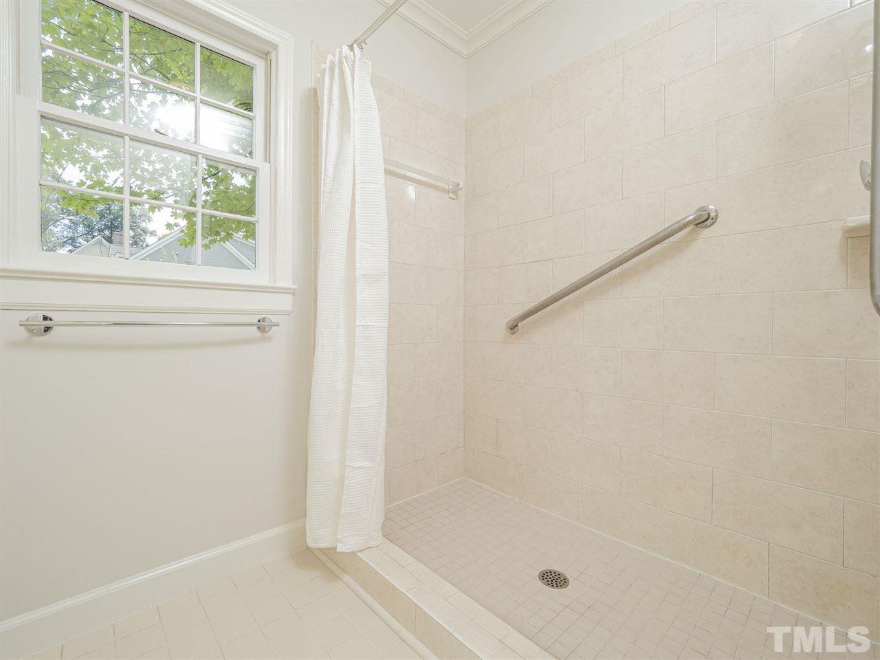 2804 Anderson Drive Raleigh, NC 27608 - Photo 16 of 23 a bathroom with a bathtub